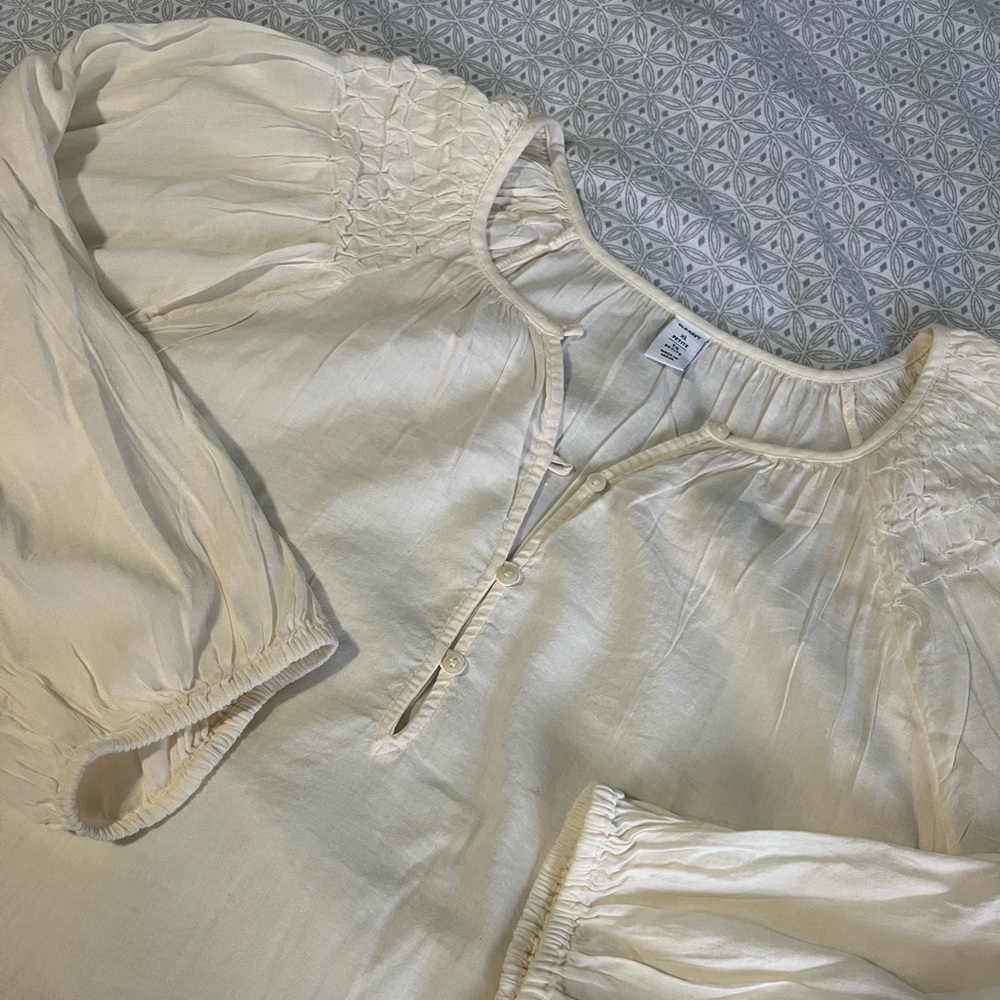 Blouse with smocked/pleated shoulder detail